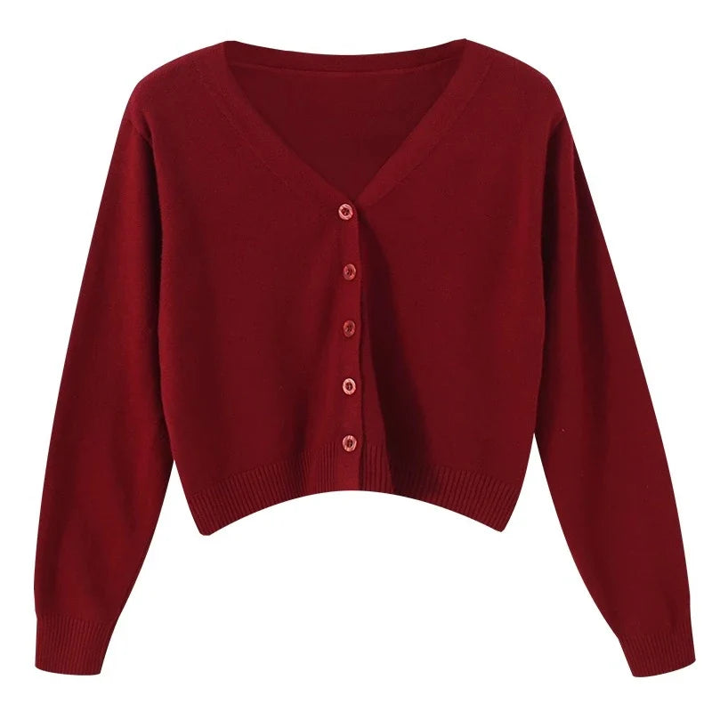 Luźny krótki sweter damski z dekoltem V. Modny top do warstwowania, uniwersalny rozmiar, styl casualowy.