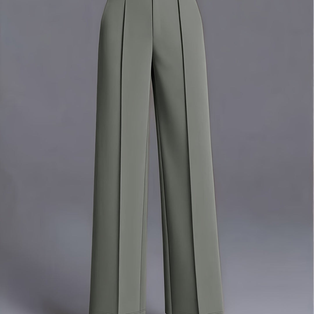 Nowoczesne damskie spodnie z wysokim stanem, szerokie nogawki. Do modnych stylizacji casual.