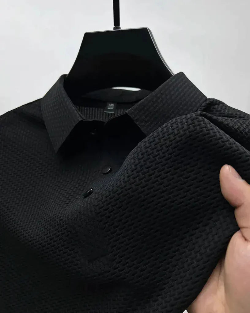 Męska koszulka polo granatowa z bawełny pique. Klasyczny fason, idealny na casualowe i eleganckie okazje.