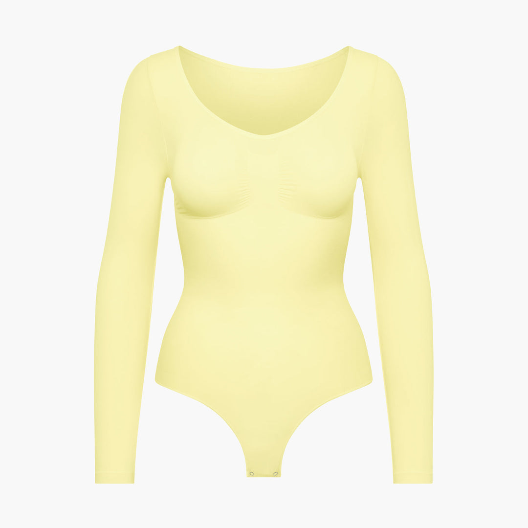 Eleganckie damskie body modelujące, bezszwowe, długi rękaw. Idealne na chłodne jesienne i zimowe dni.