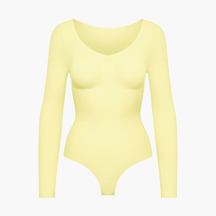 Eleganckie damskie body modelujące, bezszwowe, długi rękaw. Idealne na chłodne jesienne i zimowe dni.