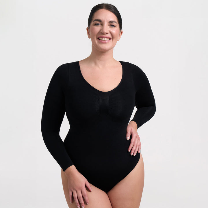 Gładkie damskie body modelujące, bezszwowe, długi rękaw. Doskonałe pod marynarkę czy sweter na jesień.