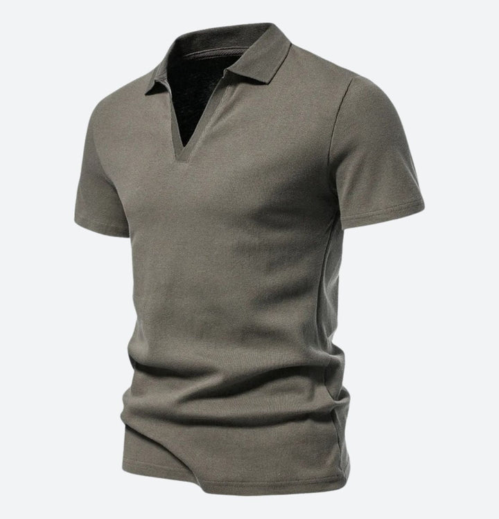 Męska koszulka polo w klasycznym stylu. Granatowa odzież casual z kołnierzykiem, idealna na letnie dni.