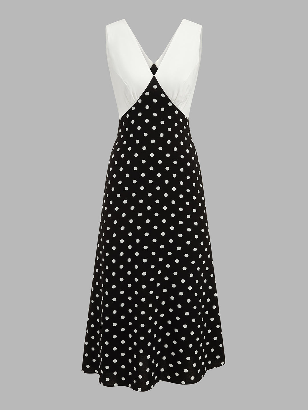 Zwiewna, letnia sukienka maxi w modne groszki, kobieca i elegancka, bez rękawów.
