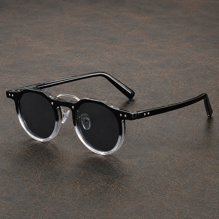 Unisex okulary z ciemnymi okrągłymi szkłami. Modny dodatek na lato, ochrona UV.