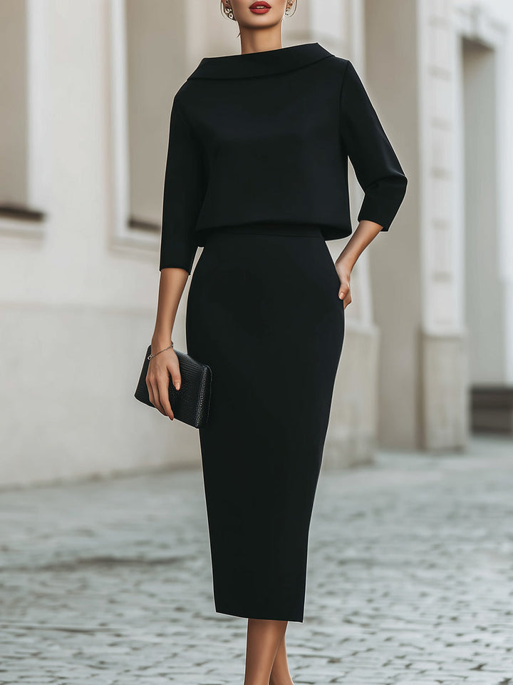 Damski komplet bluzka i spódnica midi. Elegancki zestaw na każdą okazję, zapewnia komfort noszenia.