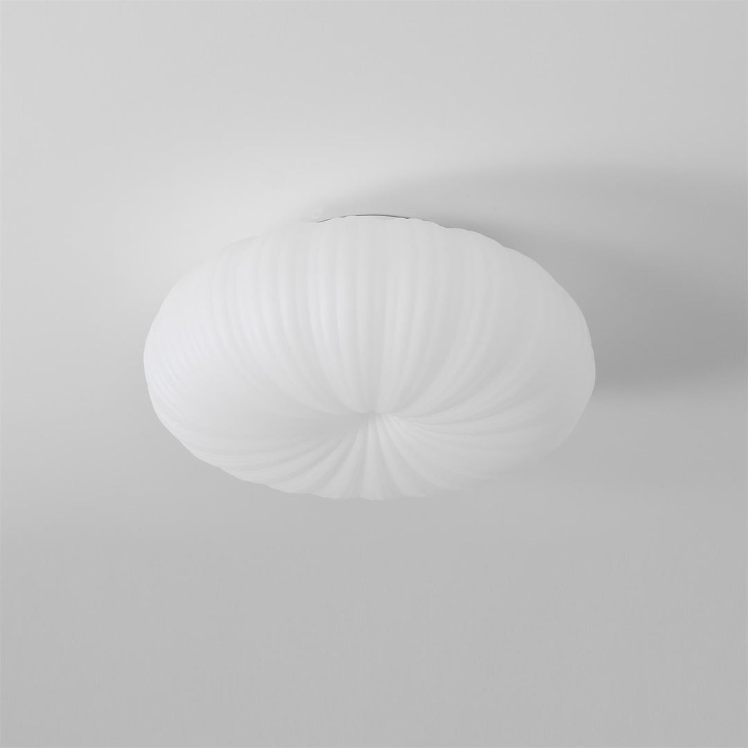 Lampa sufitowa LED montowana na suficie, widok z boku, nowoczesny design.