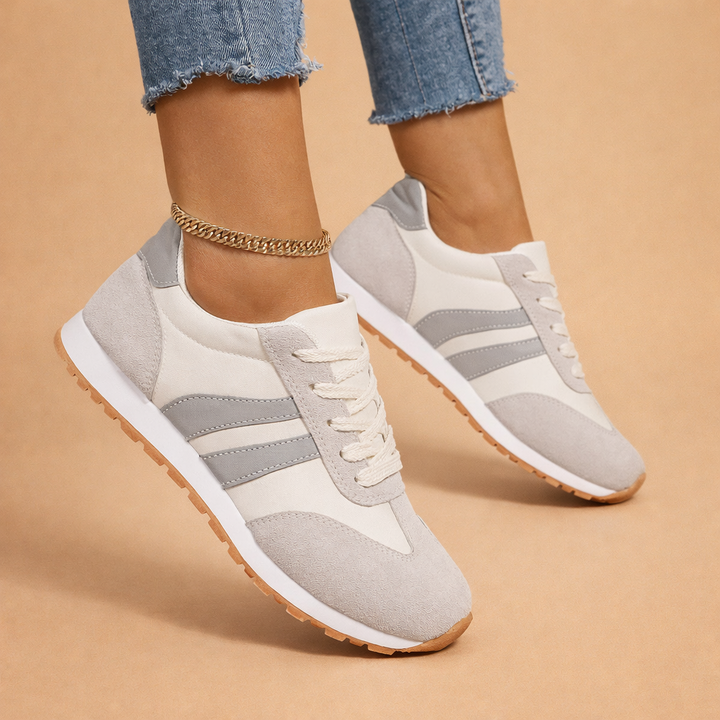 Stylowe szare buty damskie sportowe, oddychające, zapewniające komfort i lekkość na każdy dzień.