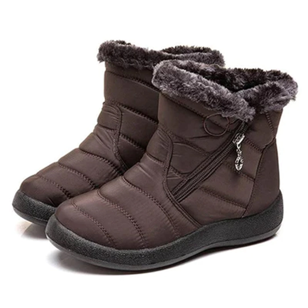 Zimowe buty Julia dla kobiet, elegancki fason, idealne do codziennych stylizacji.