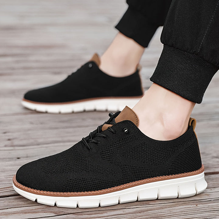 Wygodne męskie buty sportowe – sneakersy z amortyzacją, idealne do codziennych stylizacji, lekkie i sznurowane.
