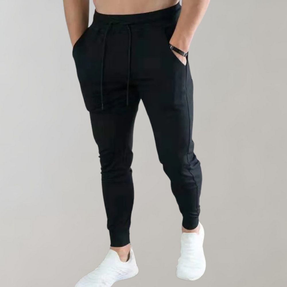 Męskie spodnie dresowe slim fit z bawełny, idealne na wiosnę. Wygodne sportowe joggery.