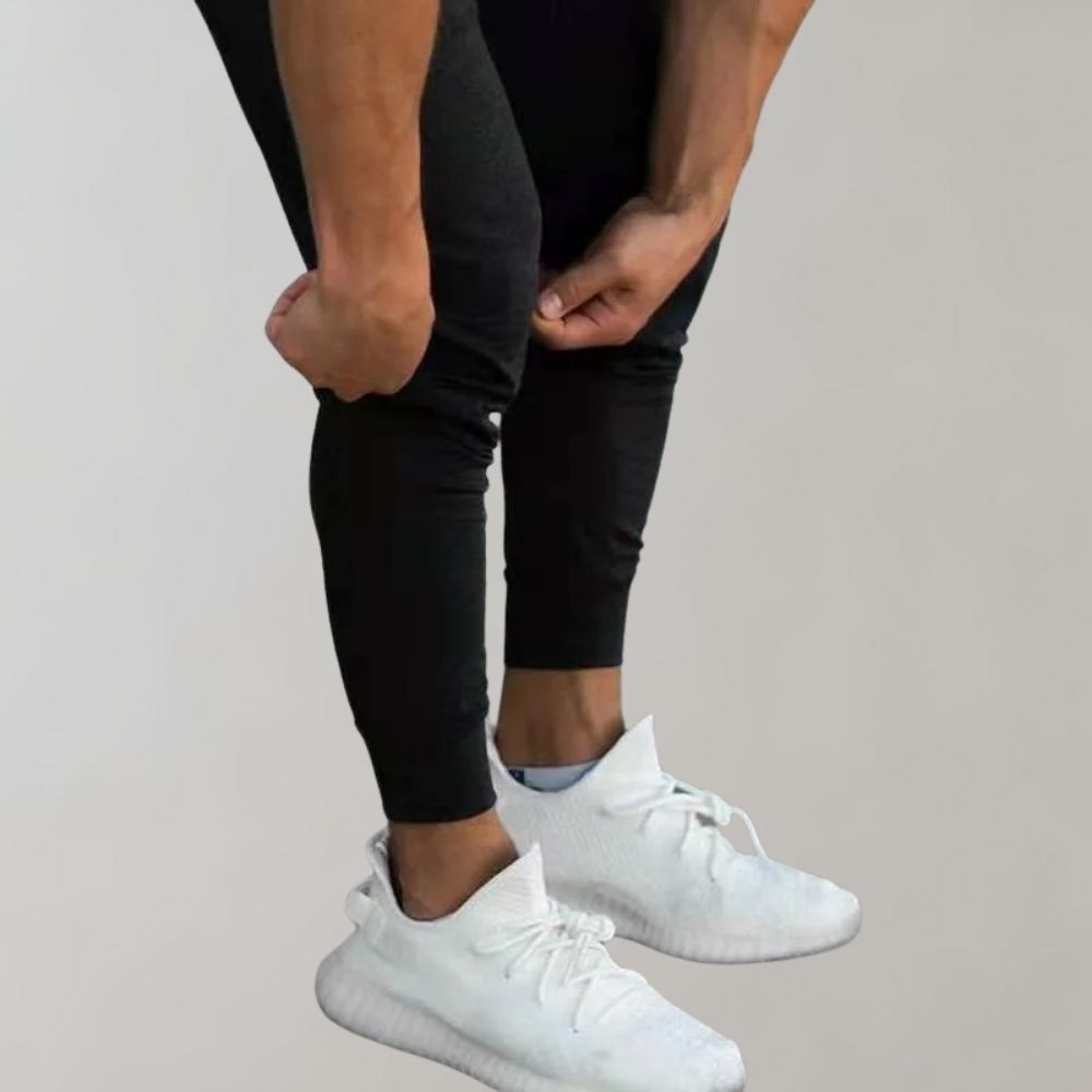 Męskie spodnie sportowe slim fit z bawełny, idealne do biegania wiosną, przewiewne i wygodne.