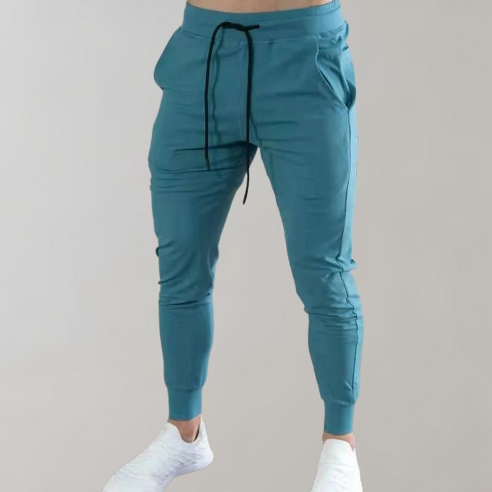 Męskie joggery slim fit z miękkiej bawełny, idealne do sportu, fitnessu i na co dzień wiosną.