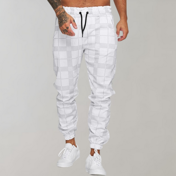 Joggery męskie slim fit, bawełniane. Stylowe i komfortowe spodnie casualowe do streetwearowych zestawów.