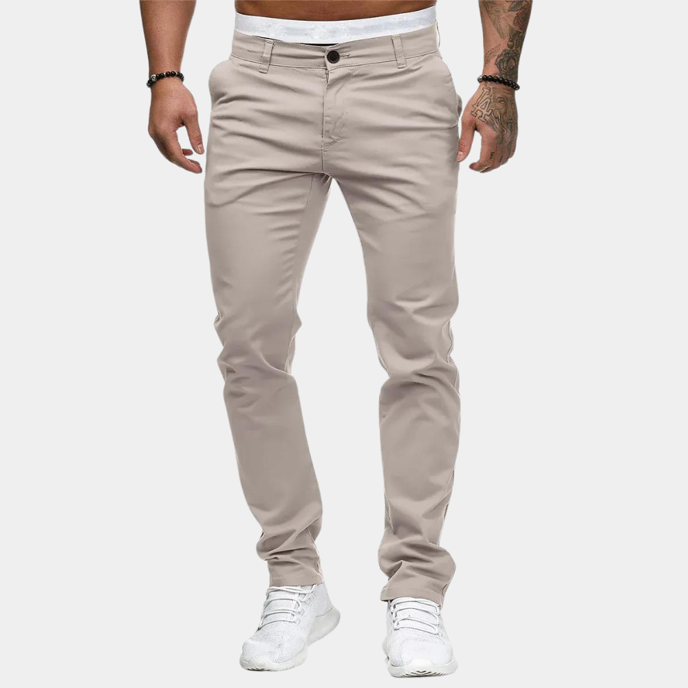Eleganckie męskie chinosy slim fit z wysokiej jakości bawełny. Idealne casualowe spodnie na wiosnę.