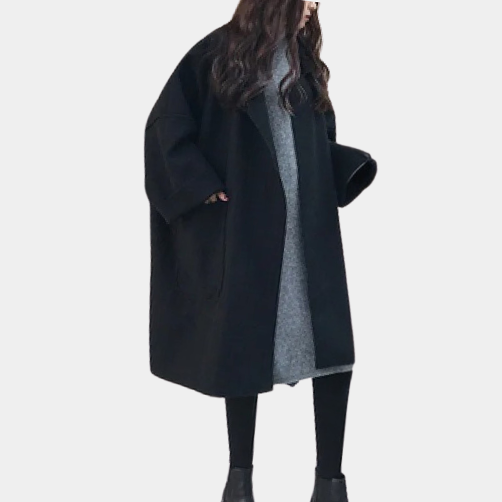 Modny długi płaszcz oversize damski na wiosnę. Klasyczny, elegancki płaszcz przejściowy dla stylowych kobiet.