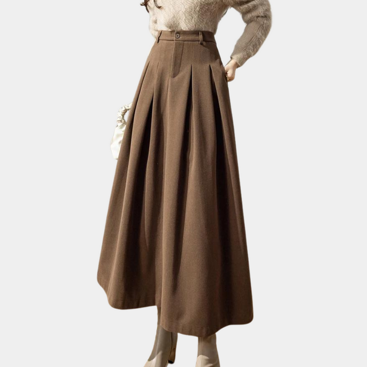 Elegancka spódnica midi damska w czerni. Stylowy krój, idealna do biura i na wyjścia.