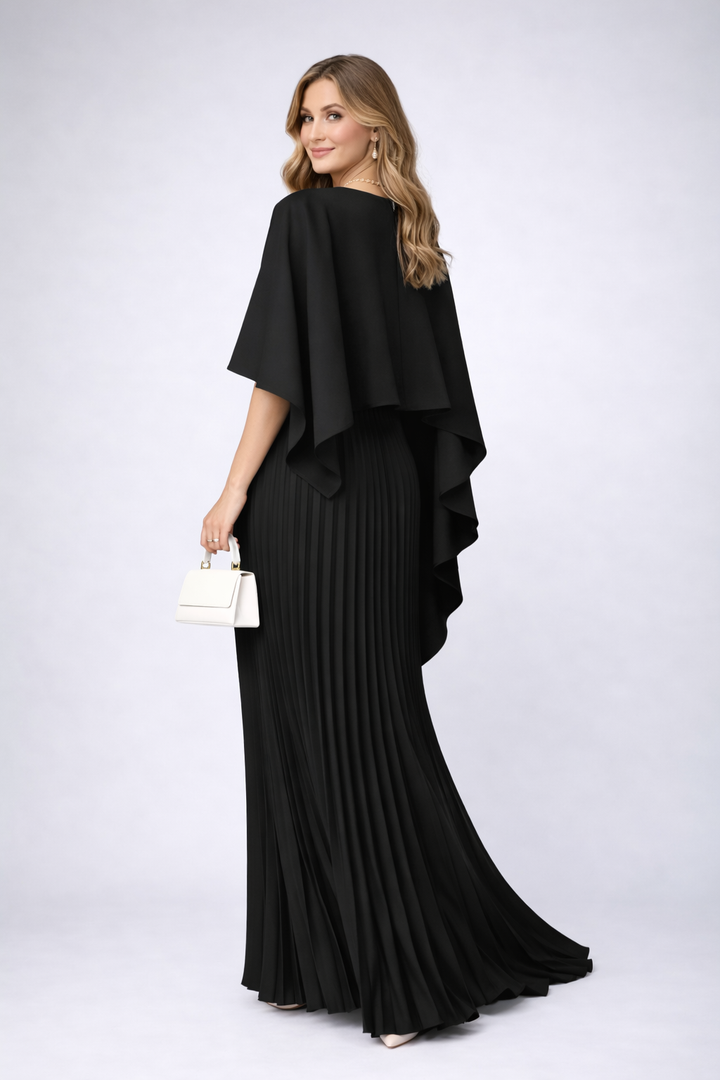Modna plisowana sukienka maxi z wysokim kołnierzem, tworząca elegancką, wieczorową stylizację.