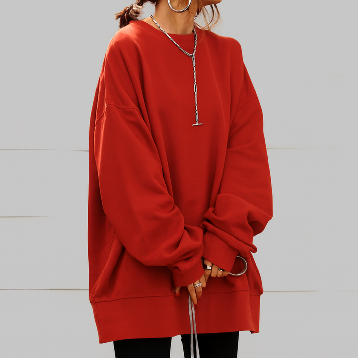 Casualowy damski sweter oversize. Modny, luźny krój z dzianiny, idealny na wiele okazji. Komfortowy element garderoby.