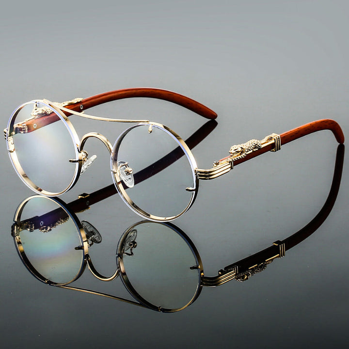 Unisex okulary przeciwsłoneczne w stylu retro z metalową oprawą. Modne okrągłe szkła idealne na słoneczne dni.