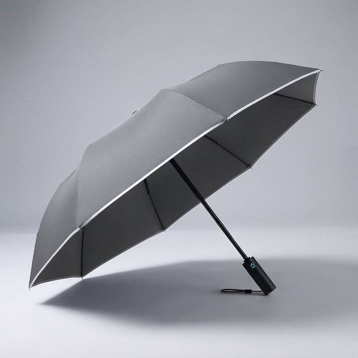 Podróżny parasol automatyczny BreezeFold. Wiatroodporny, kompaktowy design dla suchego komfortu podczas ulewy.