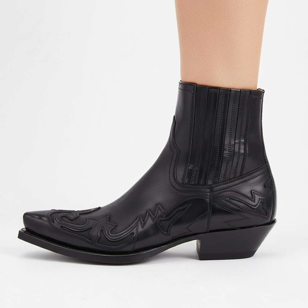 Modne botki kowbojki unisex. Skórzane obuwie z precyzyjnym haftem w stylu western, podkreślające oryginalny design.