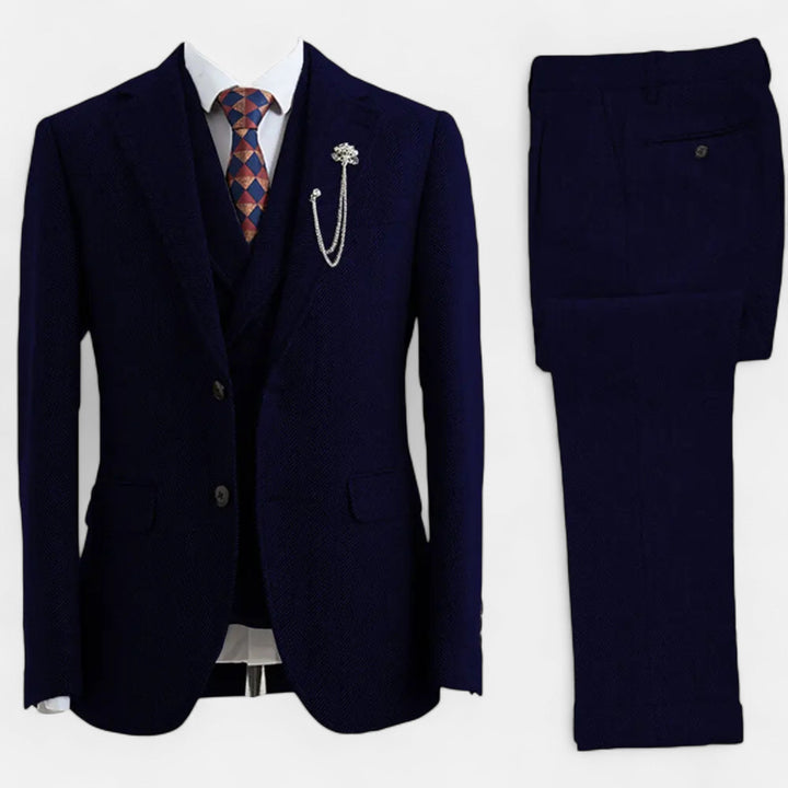 Męski garnitur slim fit trzyczęściowy w jodełkę z kamizelką. Elegancki strój biznesowy lub na ślub.
