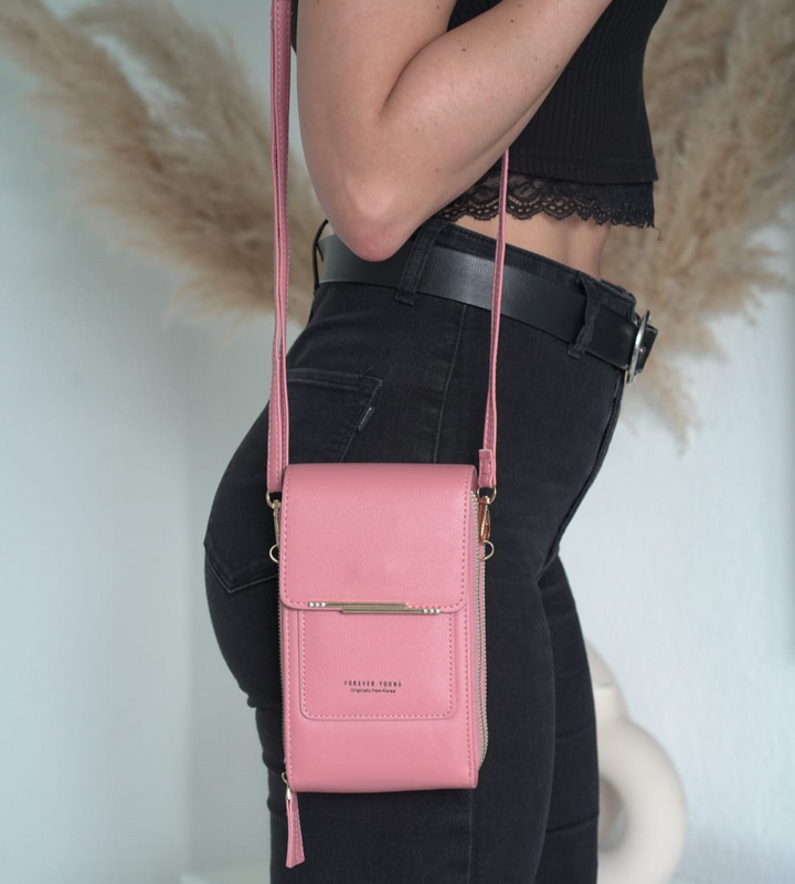 Elegancka torebka crossbody, skórzana, z regulowanym paskiem. Klasyczny styl, uniwersalne akcesorium.