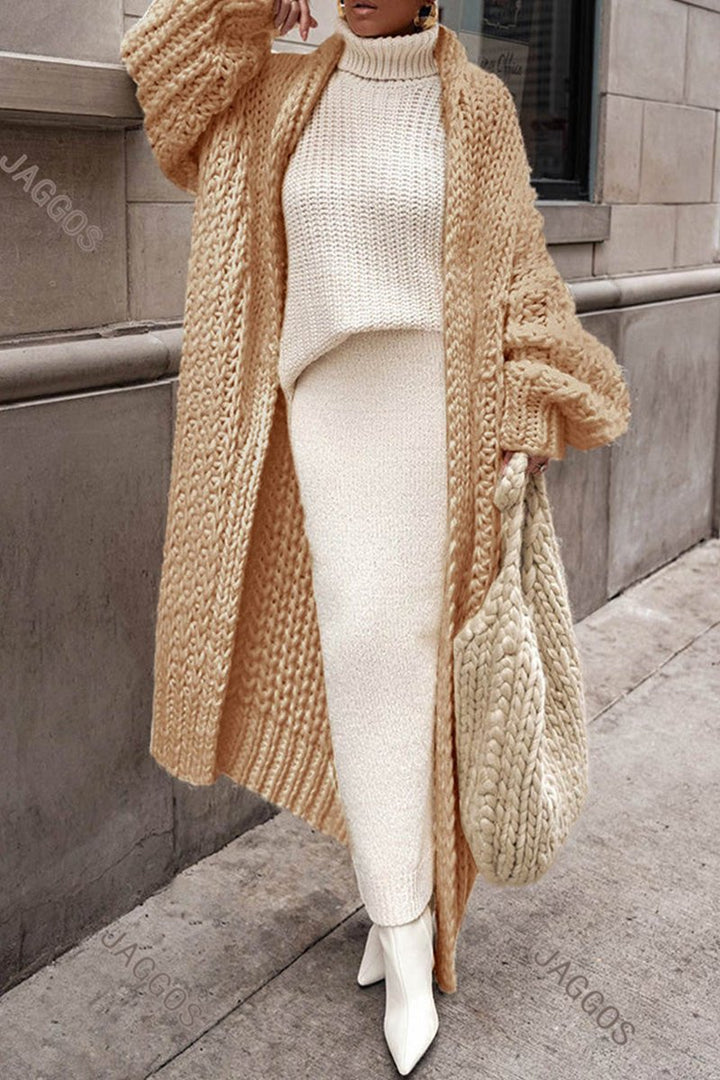 Brązowy długi kardigan damski oversize. Stylowy sweter bez zapięcia na jesień/zimę, casualowy look.