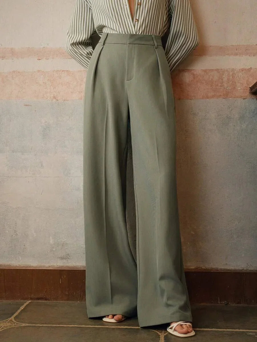 Szerokie spodnie damskie z wysokim stanem. Eleganckie do pracy, modne na co dzień. Komfortowe.