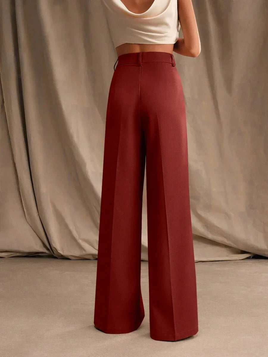 Komfortowe spodnie damskie z szerokimi nogawkami. Wysoki stan, eleganckie, do pracy i na casual.