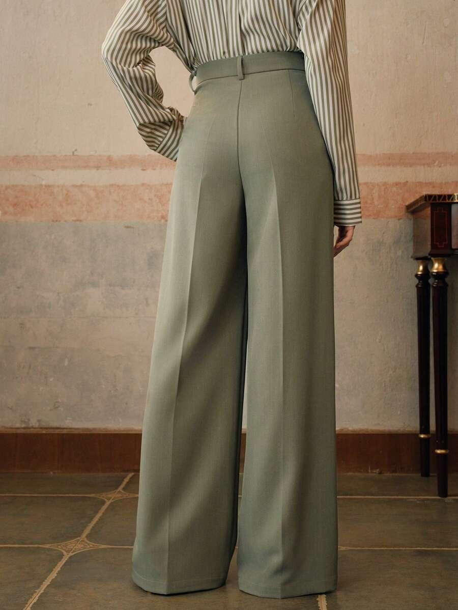 Modne, eleganckie spodnie damskie. Szerokie nogawki, wysoki stan. Klasyczne, idealne do pracy.