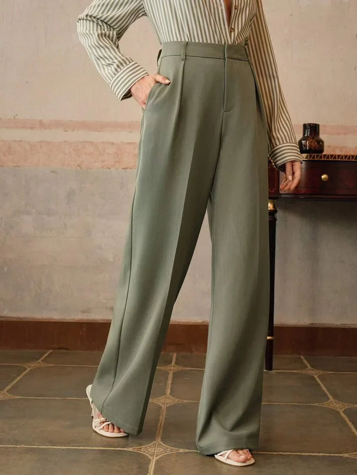 Komfortowe, szerokie spodnie damskie z wysokim stanem. Eleganckie do pracy, całoroczne.