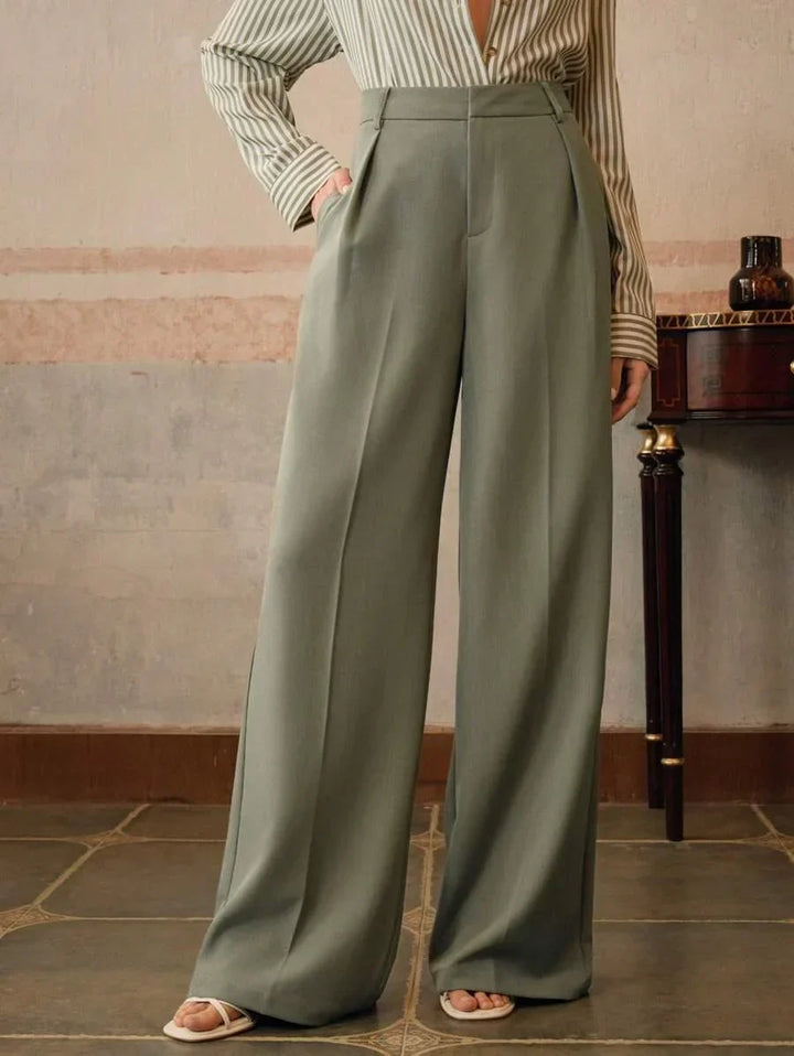 Eleganckie spodnie damskie, szerokie nogawki. Wysoki stan, modne, klasyczne, do pracy.