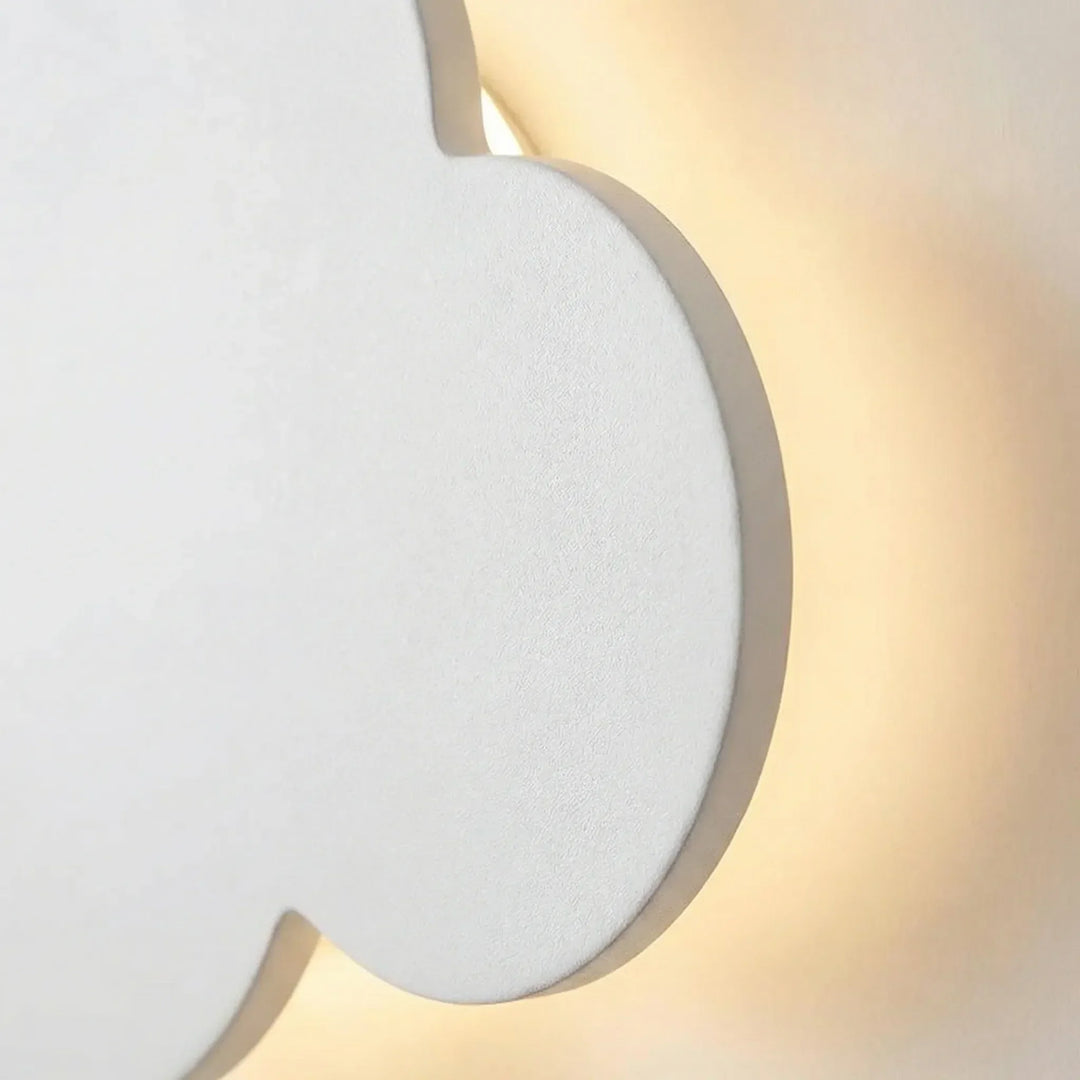 Nowoczesny kinkiet LED Cloud, ściemnialny. Lampa ścienna w kształcie chmurki do pokoju dziecięcego i sypialni.