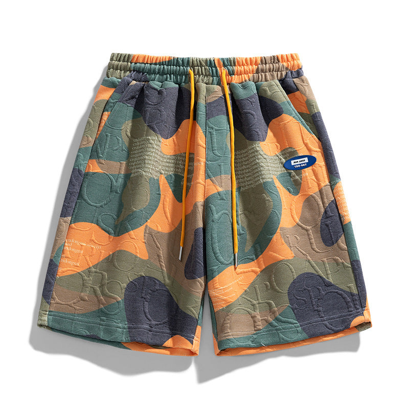 Męskie szorty camo z elastyczną talią, idealne na lato. Wygodne i stylowe szorty streetwear.
