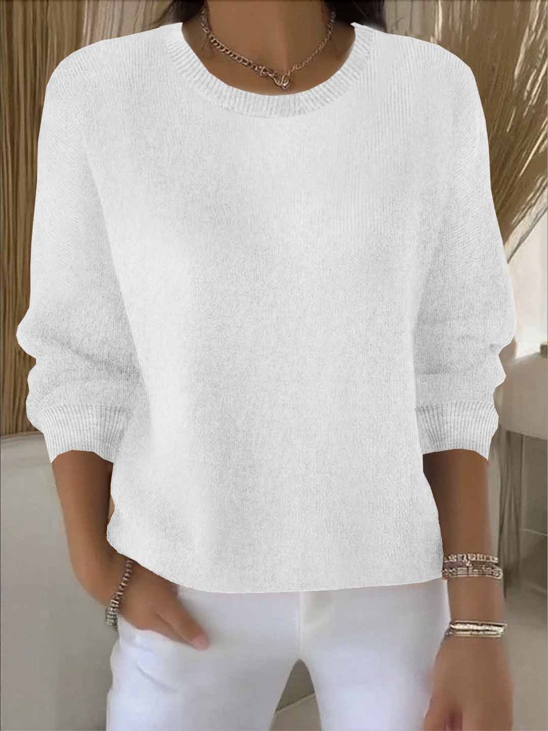 Damski dzianinowy sweter o luźnym kroju, z okrągłym dekoltem. Miękki i komfortowy.