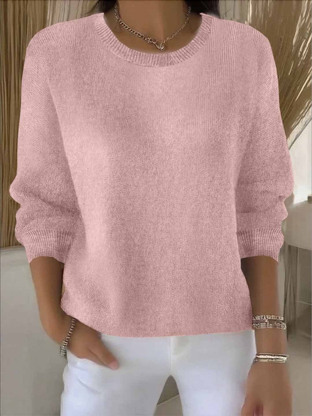 Modny, luźny sweter damski z okrągłym dekoltem. Uniwersalny styl casual na każdą okazję.
