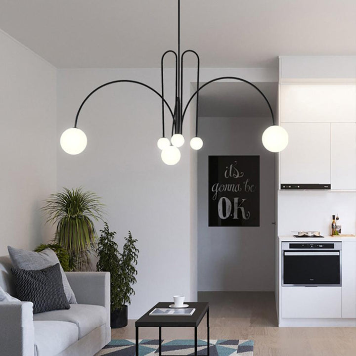 Wystrój wnętrz: elegancka lampa wisząca, luksusowe oświetlenie do salonu. Nowoczesna, metalowo-szklana.