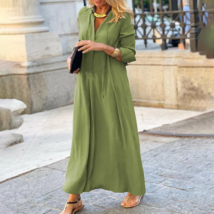 Długa damska sukienka maxi zapewniająca komfort i styl. Idealna na lato, elegancka i wszechstronna moda.
