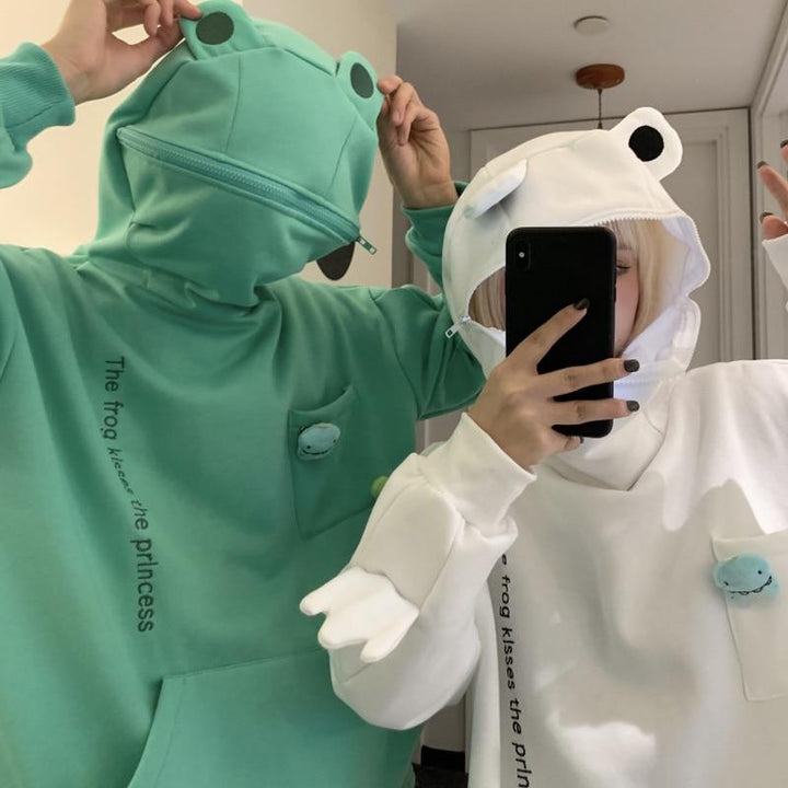 Wygodny sweter unisex z kapturem i motywem żaby. Ciepła bluza hoodie oversize na zimę i jesień.