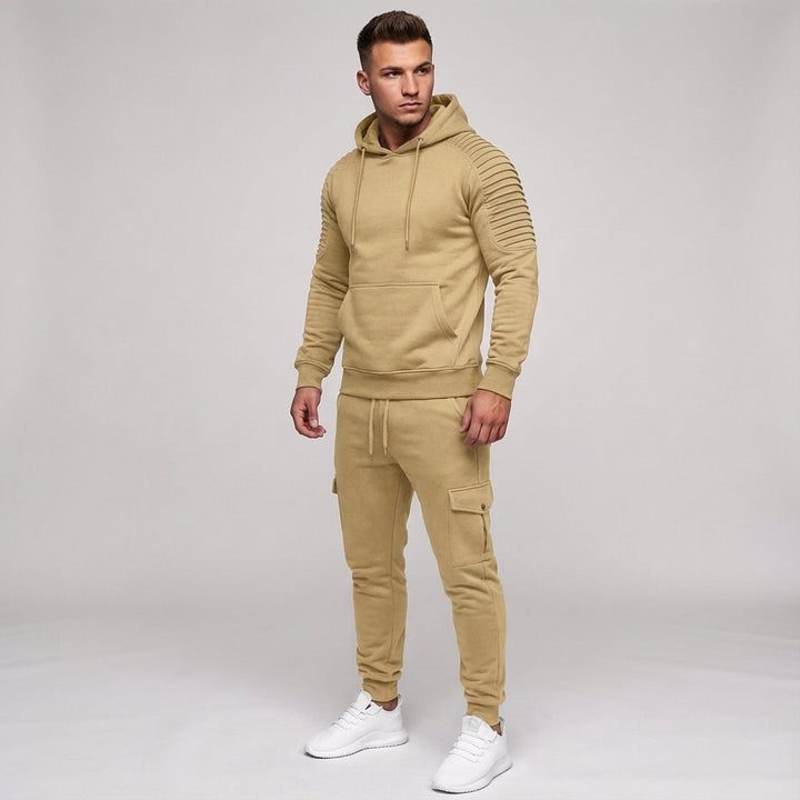 Elegancki męski dres sportowy Rodney, komplet z kapturem. Stylowy wybór dla aktywnych.