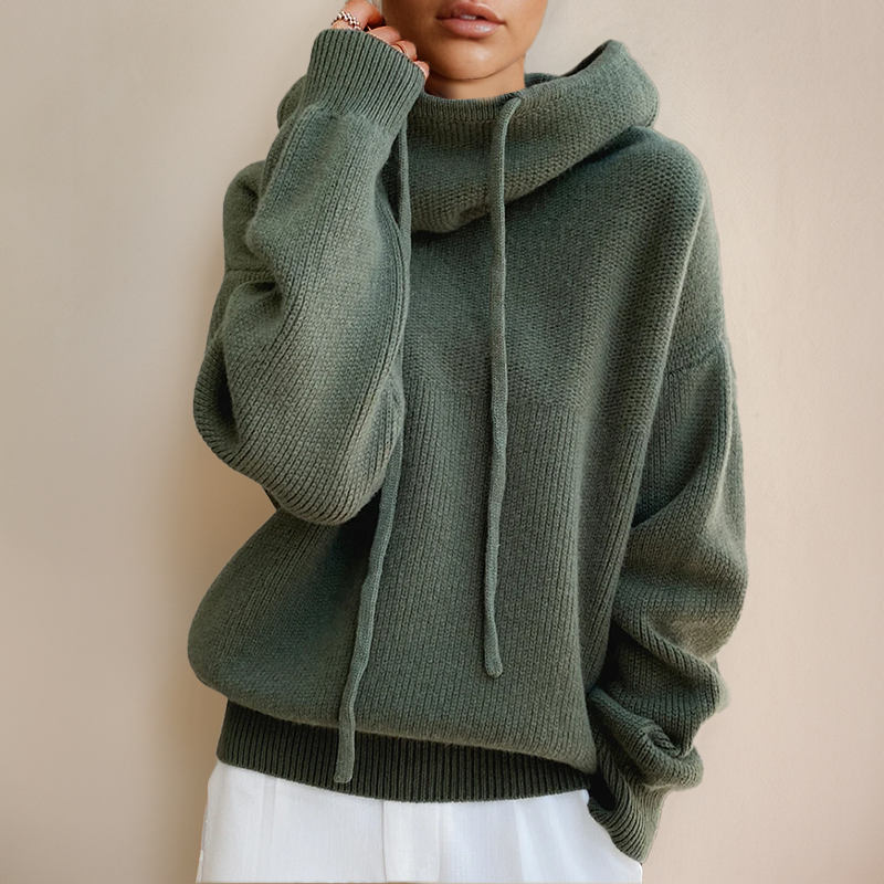 Wygodna damska bluza oversize z kapturem, idealna na co dzień. Luźny krój, komfortowa odzież damska.