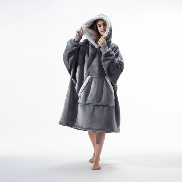 Luksusowa kocobluza oversize unisex, otulająca ciepłem i miękkością. Idealna do relaksu w domu.