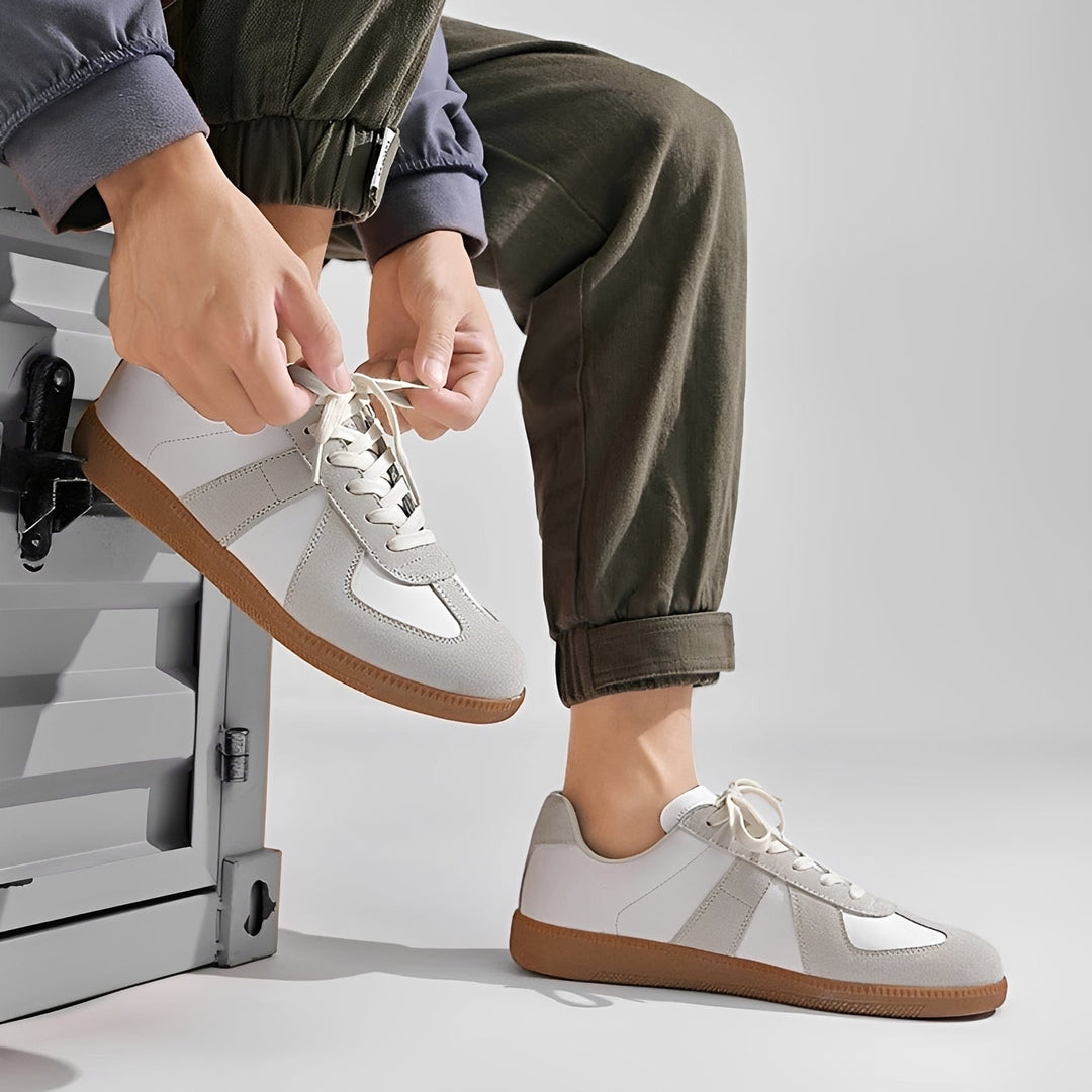 Męskie sneakersy retro z komfortową, grubą podeszwą. Stylowe obuwie sportowe idealne do casualowych stylizacji na co dzień.