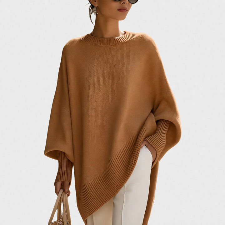 Miękki, dzianinowy sweter damski oversize. Komfortowy pulower z długim rękawem, idealny na jesień/zimę, styl casual.