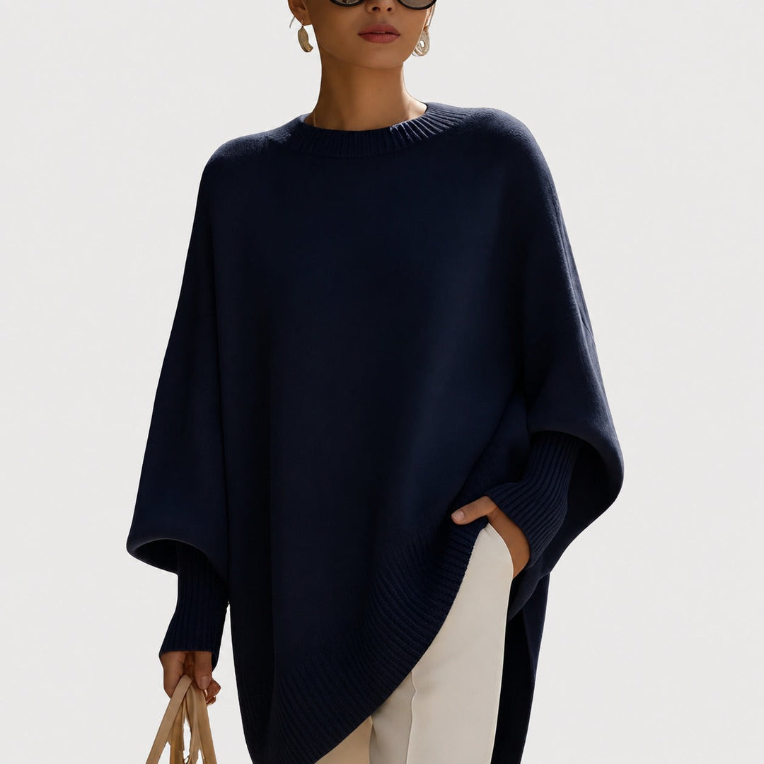 Czarny damski sweter oversize. Modny, komfortowy pulower na jesień i zimę, idealny do casualowych i eleganckich stylizacji.