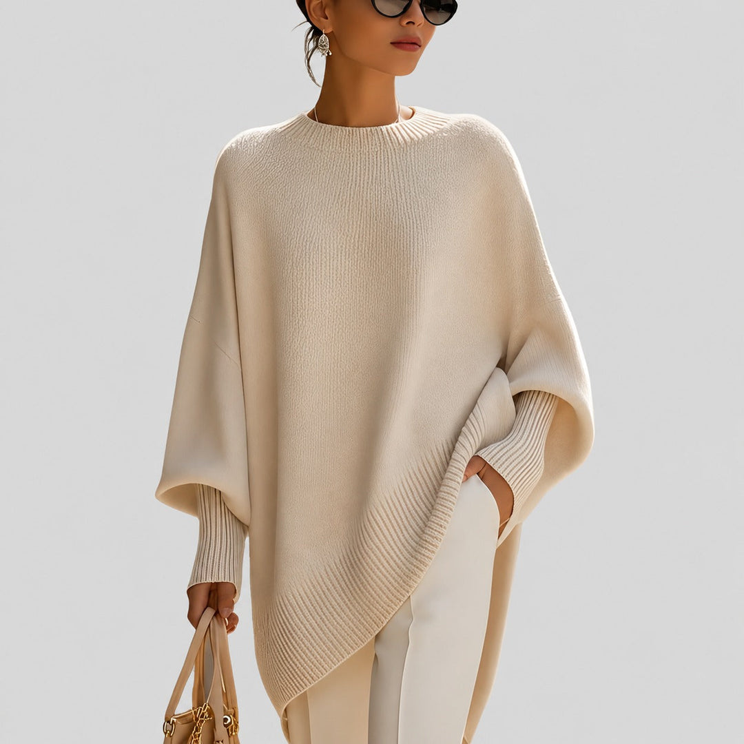Damski sweter oversize, idealny na chłodne dni. Komfortowy, modny pulower z długim rękawem do stylizacji casual.