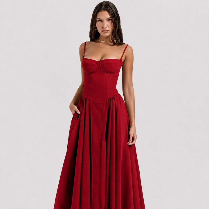 Elegancka damska sukienka midi na ramiączkach. Modna sukienka letnia casual, idealna na upalne dni.