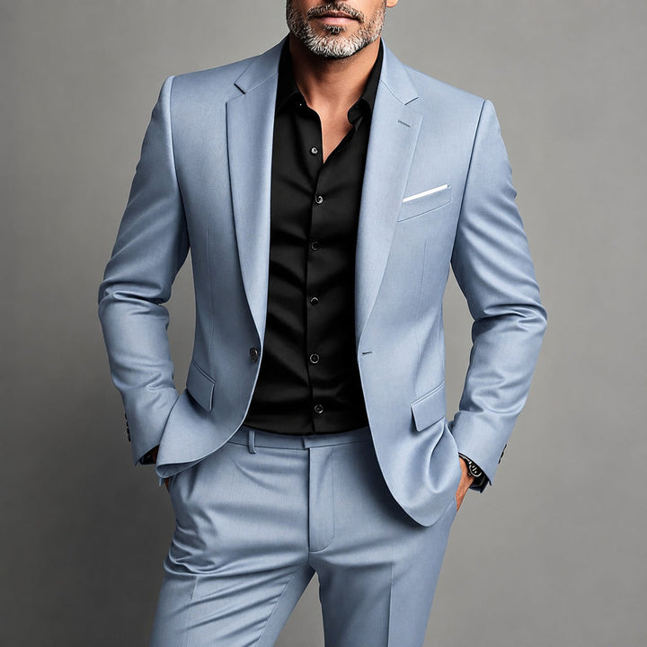Elegancki męski garnitur slim fit na wesele lub spotkanie biznesowe. Formalny komplet marynarka i spodnie, modny styl.